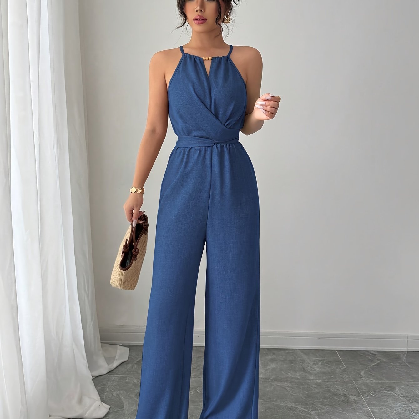 Liora – Plissee Jumpsuit mit Twist-Taille