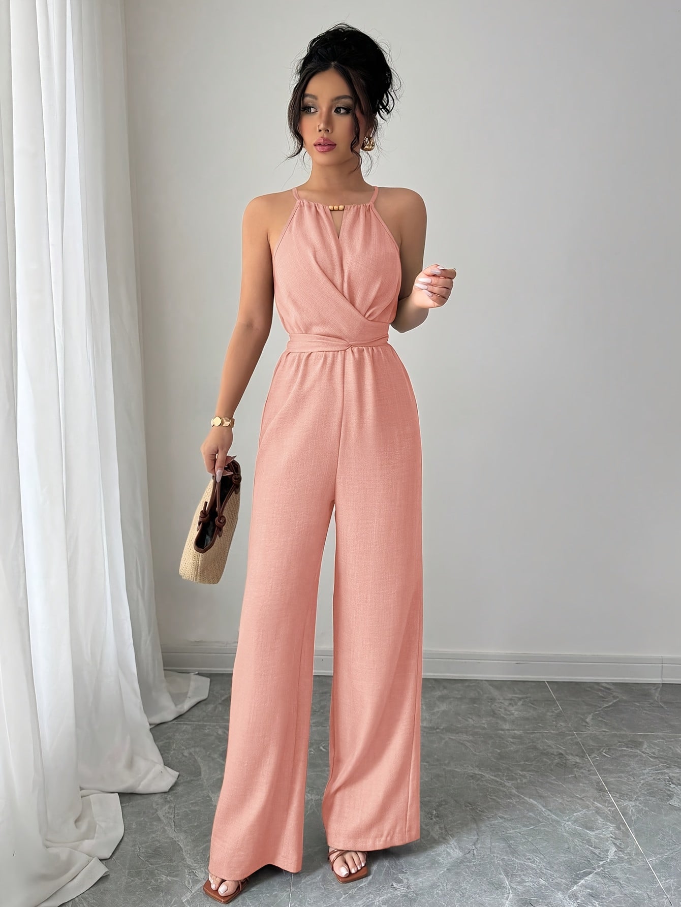 Liora – Plissee Jumpsuit mit Twist-Taille