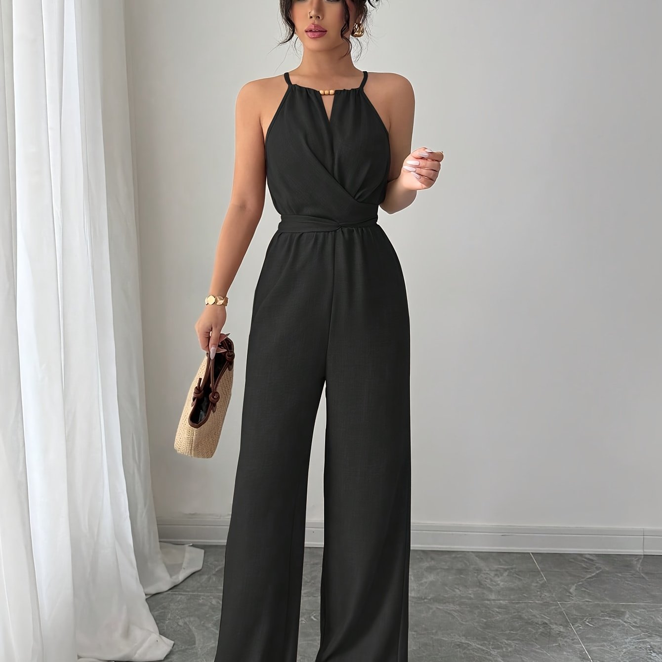 Liora – Plissee Jumpsuit mit Twist-Taille