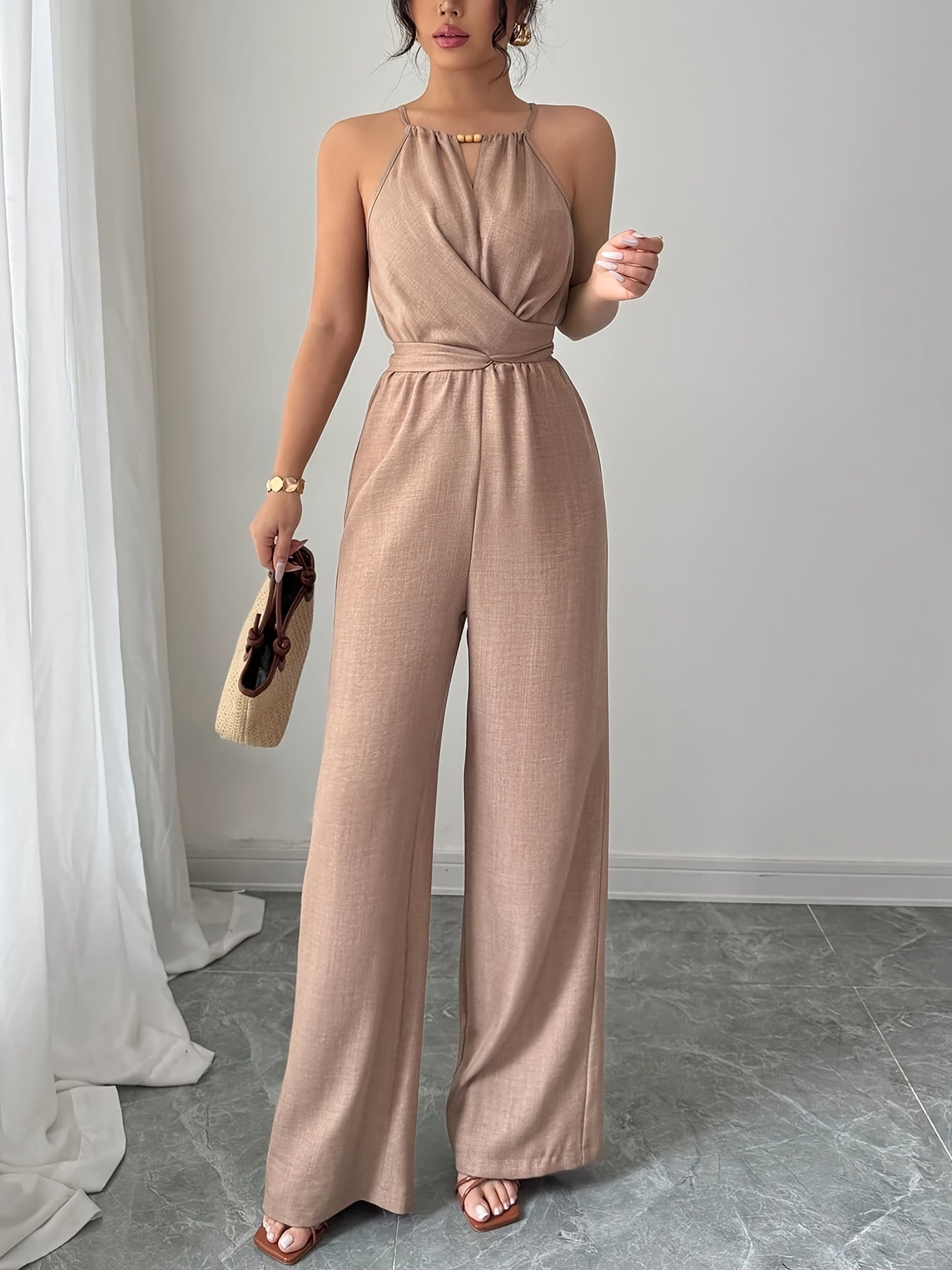 Liora – Plissee Jumpsuit mit Twist-Taille